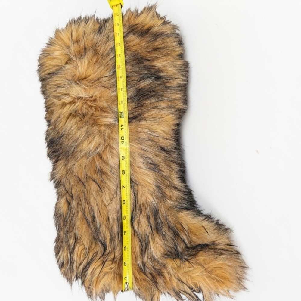 faux fur boots, often referred to as "yeti boots" or "fluffy boots". - Picture 3 of 6
